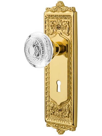 Egg and Dart Mortise-Lock Set with Matching Crystal-Glass Knobs in Polished Brass.